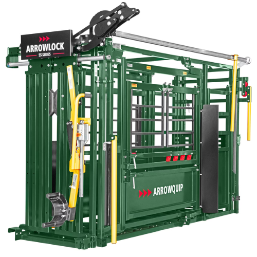 Green livestock chute labeled 