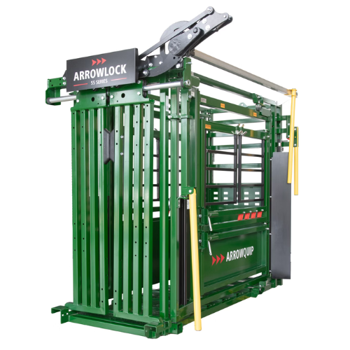 Green livestock handling chute with metal bars and panels, labeled 