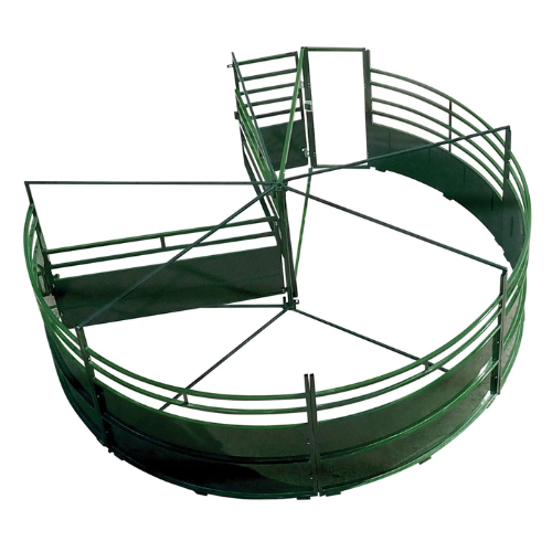 Aerial view of a metal livestock corral in a circular shape with radial dividers and gates. It is primarily green and designed for animal management.